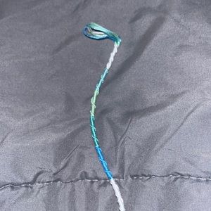 blue,teal,white and green bracelet it always can be hung in a car or backpack